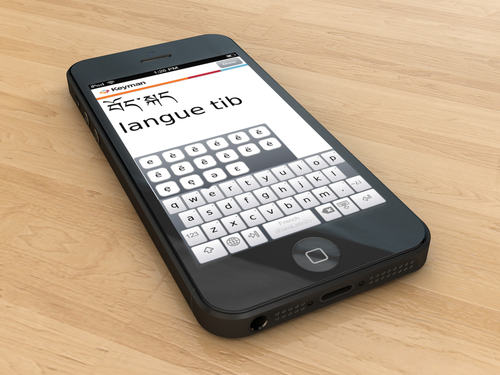 Tibetan and French (e selector visible) - on phone